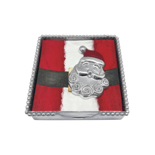 Silver Santa Claus brooch on a red and white fabric background in a decorative box.