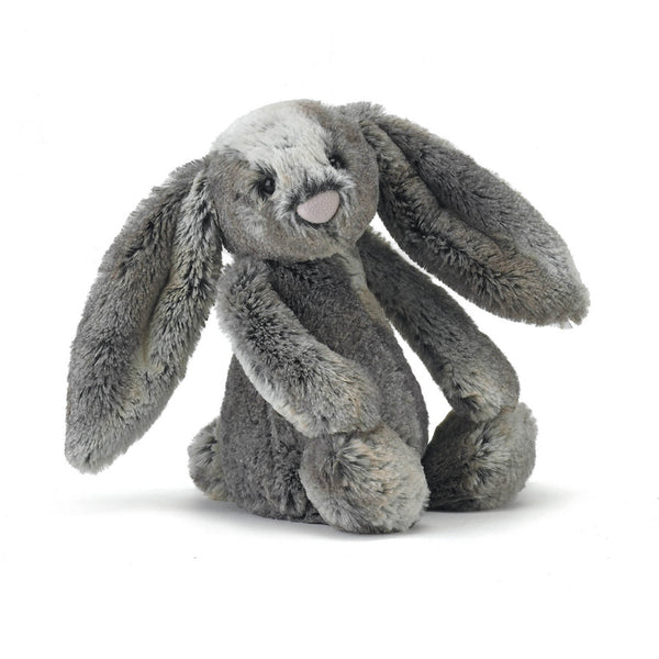 A grey plush woodland bunny sitting on a white background.