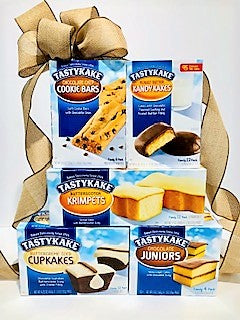 Tastykake baked goods stacked high with a big burlap bow.